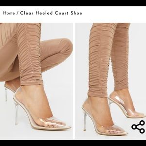 Clear heeled pumps
